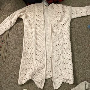 Knitted long sweater